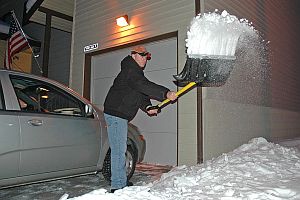 shoveling-snow-at-night